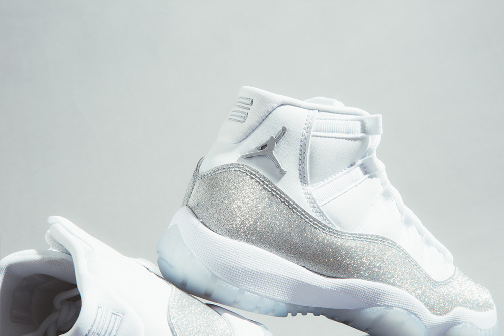 white and silver jordans 11